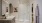 a bathroom with a shower sink and toilet