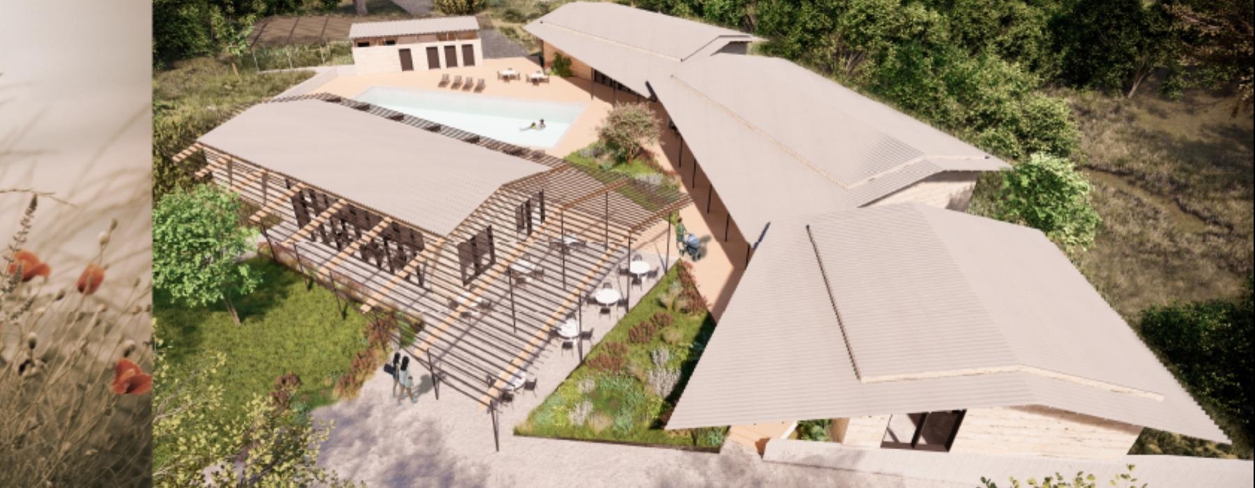 a building with a pool and trees around it