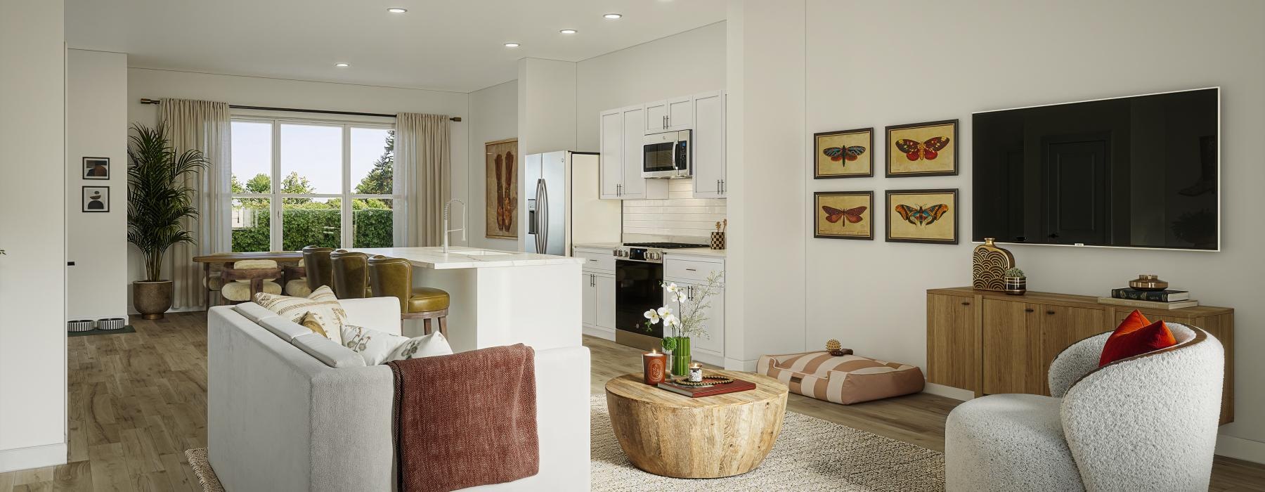 a living room with a large white couch and tv