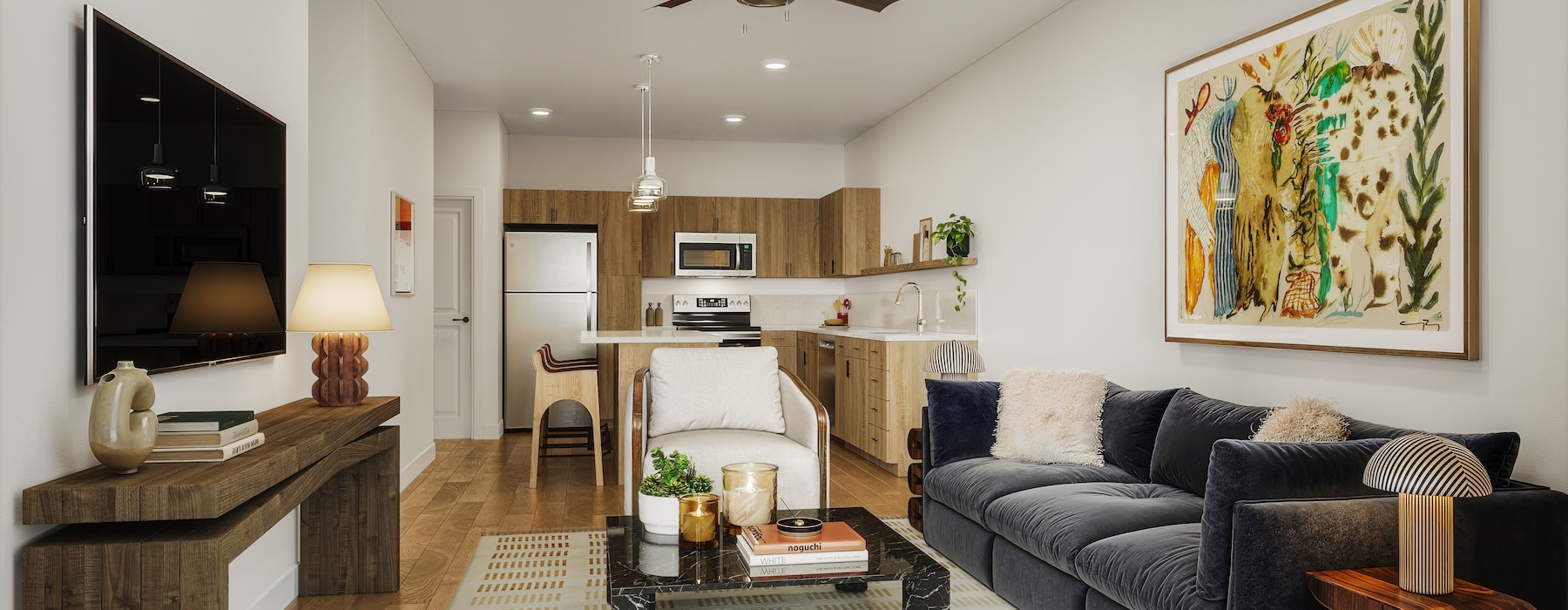 a living room with a tv couch and a table