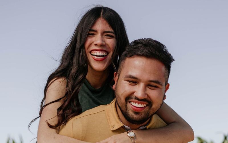 Find your perfect fit at Sonora woman embraces her husband as they smile for a picture outside